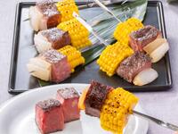 Dinner buffet featuring freshly Grilled Beef Loin Skewer and seasonal dishes