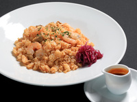 Crab and shrimp pilaf with sauce Americaine