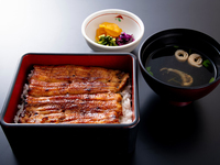 Unajū (grilled eel over rice) — served with oshinko (pickles) and suimono (clear soup)