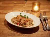 Dinner course with a Cheers Sparkling Wine at Indoor Dining Table