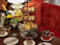 Pierre Hermé Paris Festive Afternoon Tea “Includes a glass of champagne” with a glass of champagne