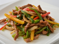 Stir-fried thin slices of Hokkaido beef and green peppers