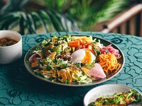 6月限定　温玉トッピングのベジタコライス　ナスのチーズ焼きとトマトスープ