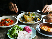 Shareable course featuring both pasta and bistro-style meat dishes (served at table seating)