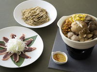 Shinshu Iizuna Duck and Local Mushroom Shabu-Shabu Golden broth infused with the aroma of soba tea, featuring free-range chicken and kombu kelp stock.