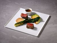 Enjoy a modern lunch with red and white wine, an appetizer buffet, and a choice of main course.
